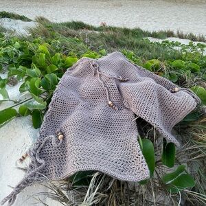 Cozy short  handmade with special soft and natural yarns.